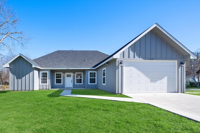 ranch-style home featuring a front lawn and a garage