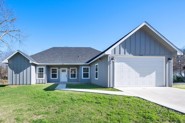 ranch-style house with a front yard and a garage