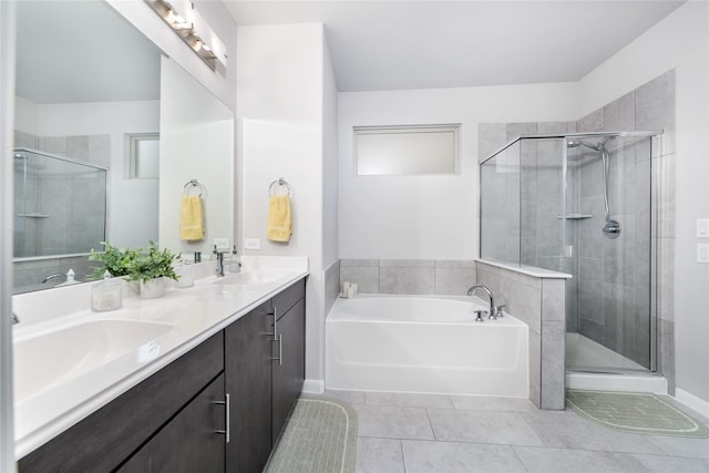 bathroom with tile patterned floors, vanity, and plus walk in shower