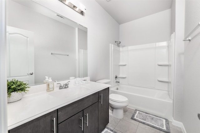 full bathroom with tile patterned flooring, shower / bathing tub combination, vanity, and toilet