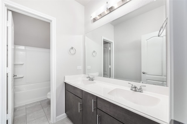 full bathroom with tile patterned flooring, vanity, toilet, and shower / tub combination