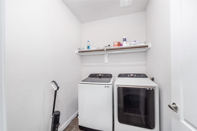 washroom featuring washing machine and dryer