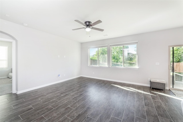 unfurnished room with plenty of natural light and ceiling fan