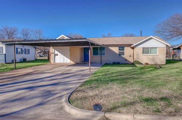 ranch-style house featuring a front lawn and a carport