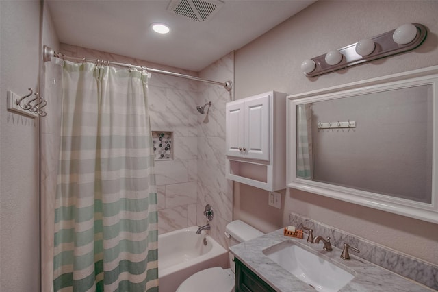 full bathroom with vanity, toilet, and shower / bath combo with shower curtain