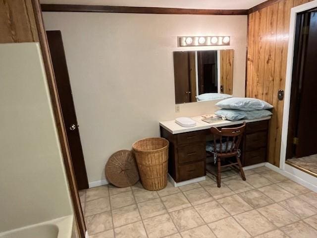 bathroom featuring wood walls, vanity, and independent shower and bath