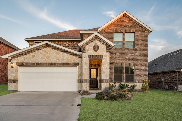 view of front of house with a garage and a front yard