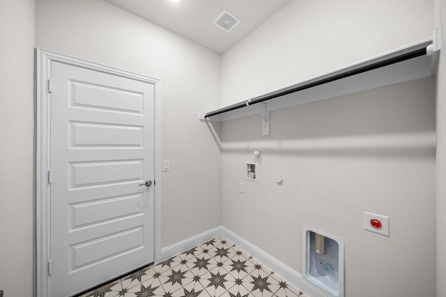 clothes washing area featuring hookup for an electric dryer, hookup for a gas dryer, and hookup for a washing machine