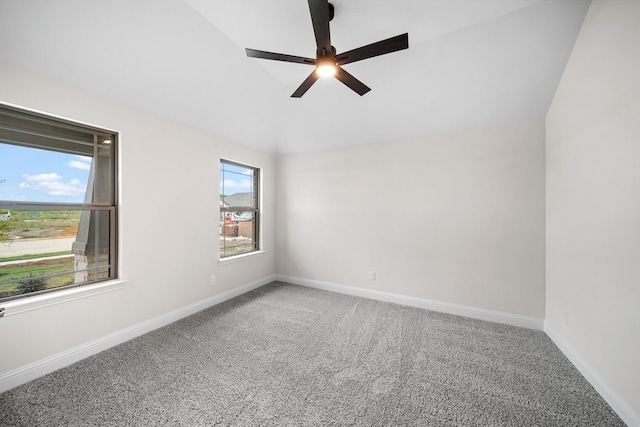 spare room with ceiling fan and carpet floors