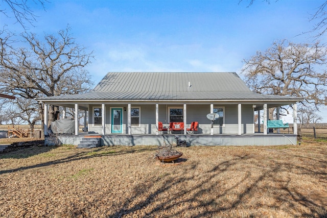 country-style home with a front yard