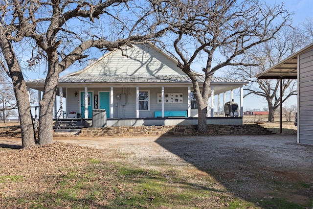 farmhouse inspired home with covered porch