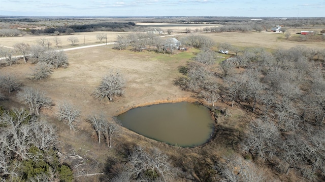 bird's eye view with a water view and a rural view