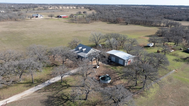 birds eye view of property featuring a rural view