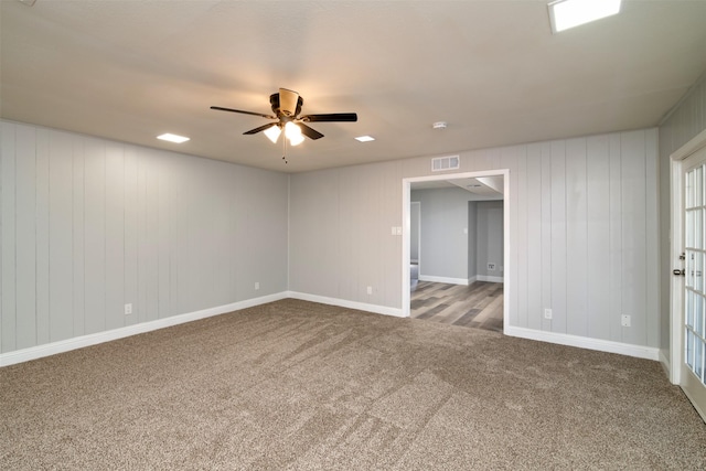 carpeted empty room with ceiling fan