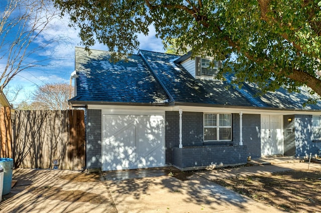 exterior space with a garage