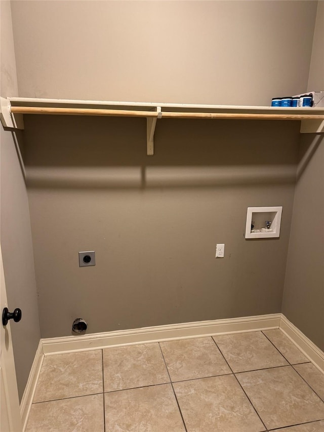 laundry room featuring tile patterned floors, washer hookup, and hookup for an electric dryer