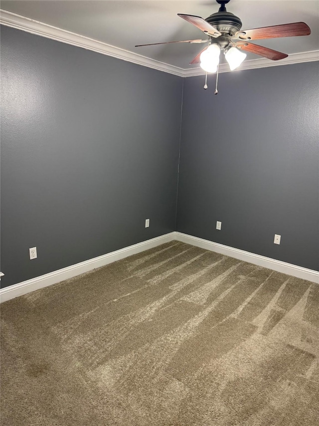 unfurnished room with carpet flooring, ceiling fan, and ornamental molding