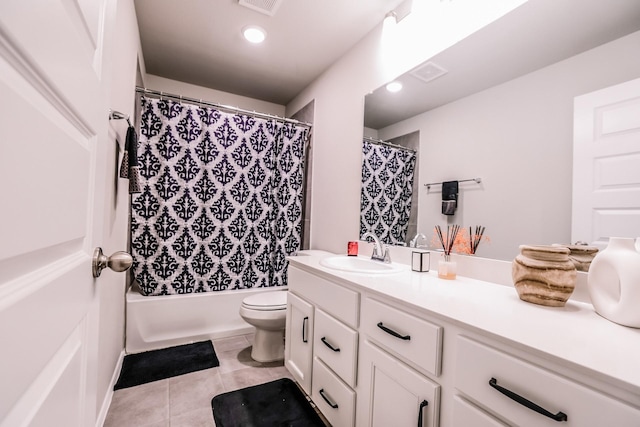 full bathroom featuring tile patterned flooring, vanity, shower / bath combination with curtain, and toilet