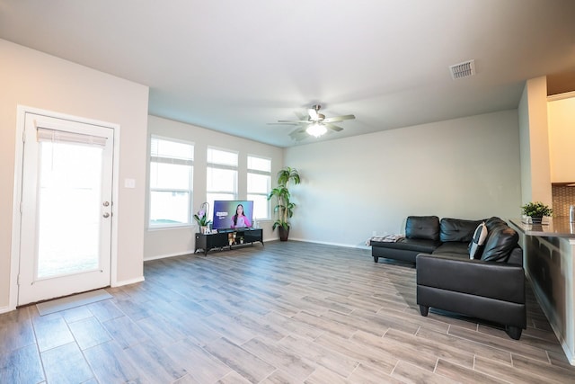 living room with ceiling fan