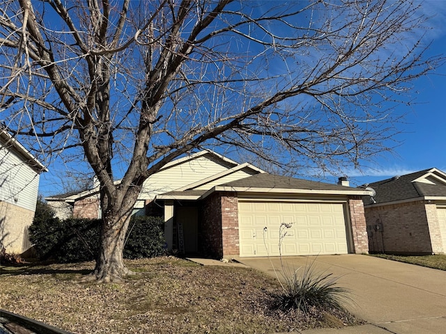 view of side of home with a garage