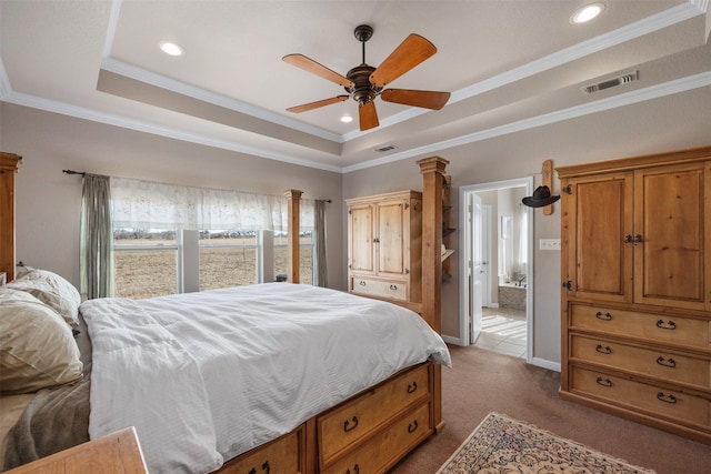 bedroom with a raised ceiling, ceiling fan, crown molding, and dark colored carpet