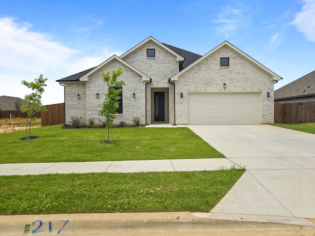 217 Rosemary Dr, Azle, TX 76020 - view of front of home with driveway, a garage, and brick siding