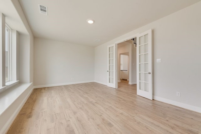 1224 Calebria Way, Fate, TX 75087 - spare room featuring french doors, light wood-type flooring, baseboards, and recessed lighting