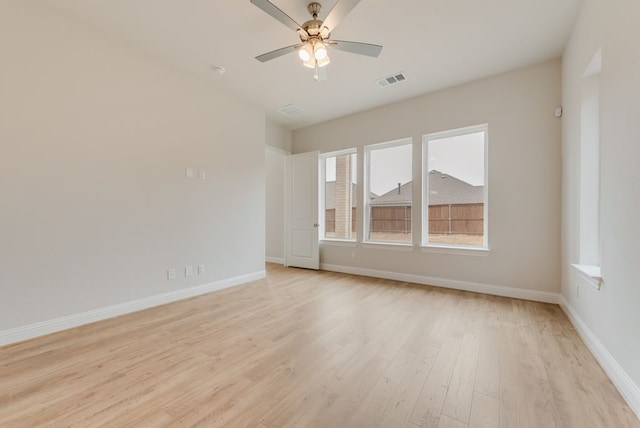 1224 Calebria Way, Fate, TX 75087 - unfurnished room featuring light wood-style flooring, baseboards, and a ceiling fan
