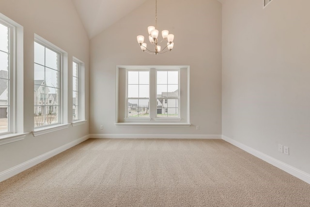 1224 Calebria Way, Fate, TX 75087 - spare room featuring healthy amount of natural light, light colored carpet, a chandelier, baseboards, and high vaulted ceiling