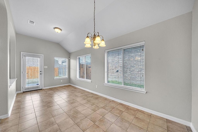 unfurnished room with lofted ceiling, a healthy amount of sunlight, visible vents, and an inviting chandelier