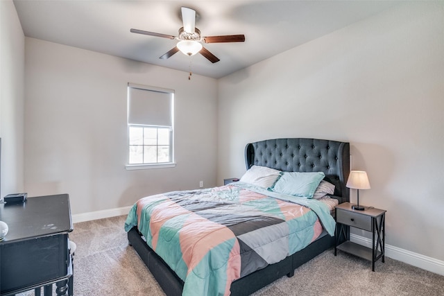 bedroom featuring ceiling fan and light carpet