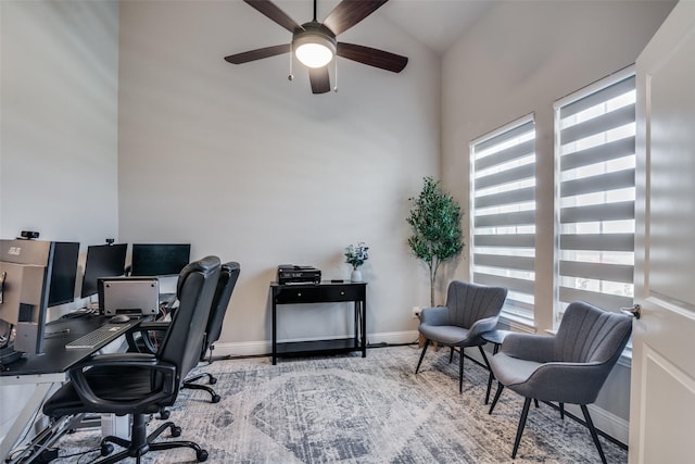 office with ceiling fan and lofted ceiling