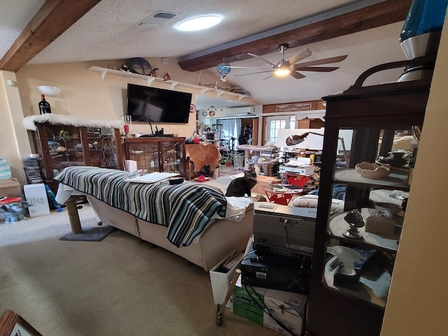 carpeted bedroom with lofted ceiling with beams and a textured ceiling