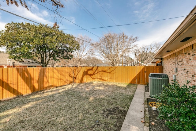 view of yard featuring central AC