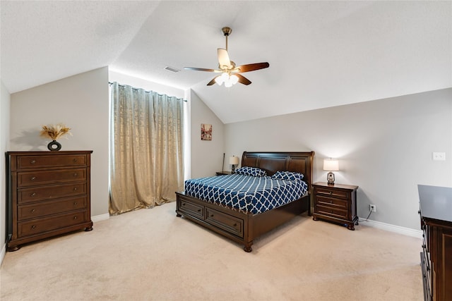 carpeted bedroom featuring ceiling fan and lofted ceiling