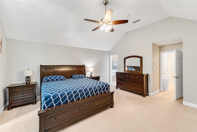 carpeted bedroom with ensuite bath, ceiling fan, and lofted ceiling