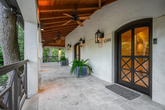 view of patio featuring covered porch and ceiling fan