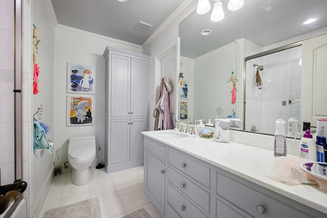 bathroom with tile patterned flooring, toilet, vanity, a shower with shower door, and ornamental molding