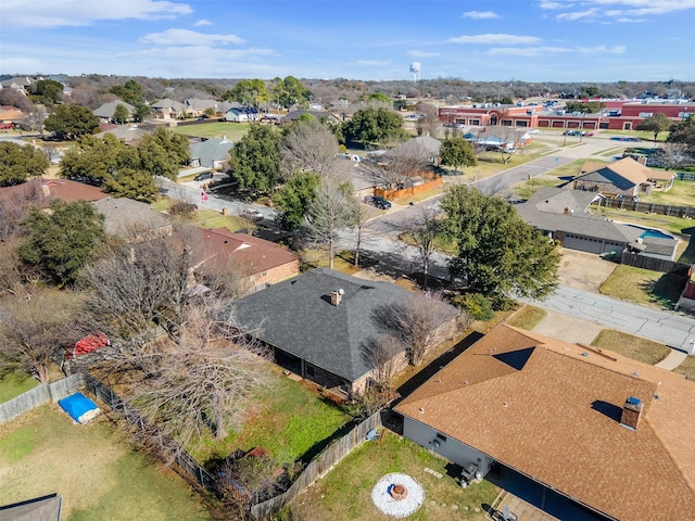 birds eye view of property with a residential view