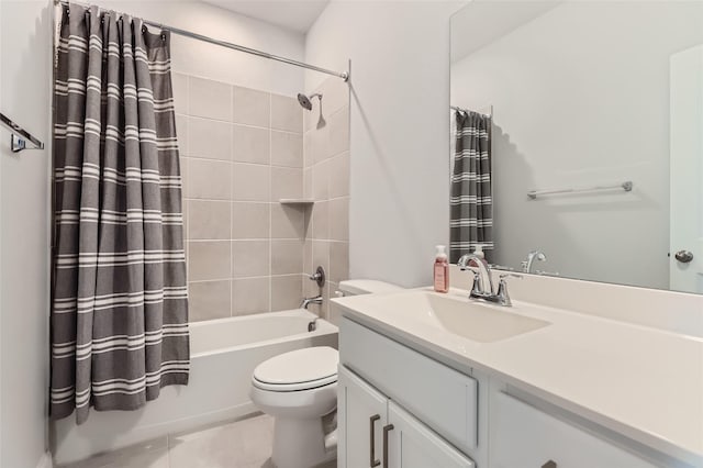 full bathroom with toilet, tile patterned flooring, shower / bath combo, and vanity