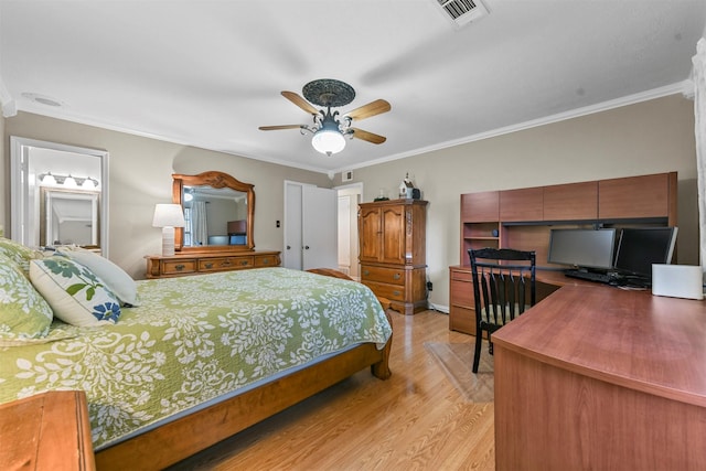 bedroom featuring ceiling fan, crown molding, and light hardwood / wood-style flooring