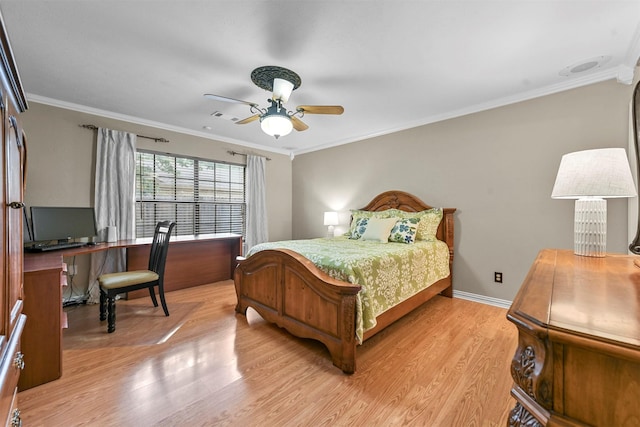 bedroom with light wood-type flooring, ceiling fan, and crown molding