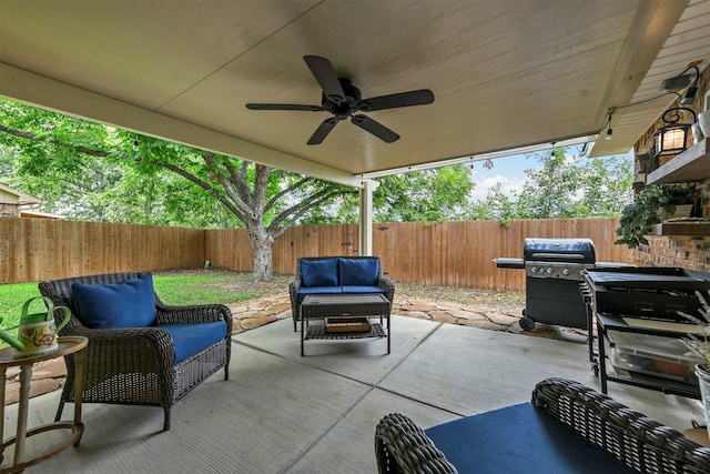 view of patio / terrace featuring an outdoor living space, ceiling fan, and a grill