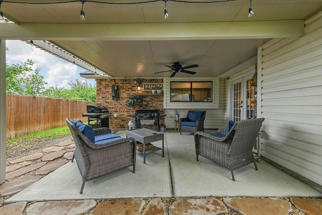 view of patio featuring a grill, ceiling fan, and an outdoor hangout area