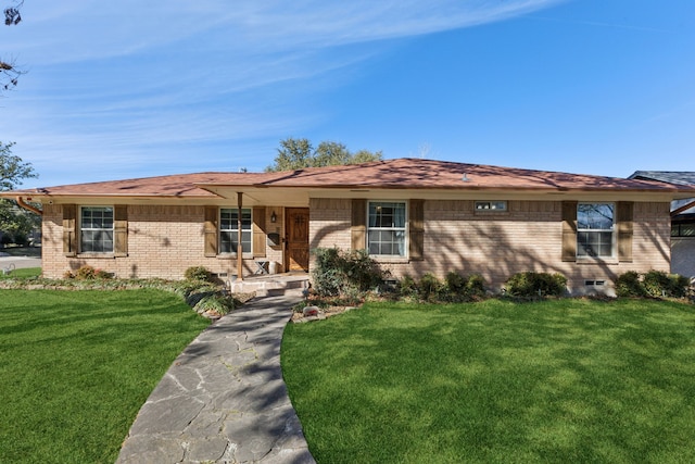 single story home with a front yard