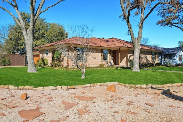 view of front of property with a front lawn