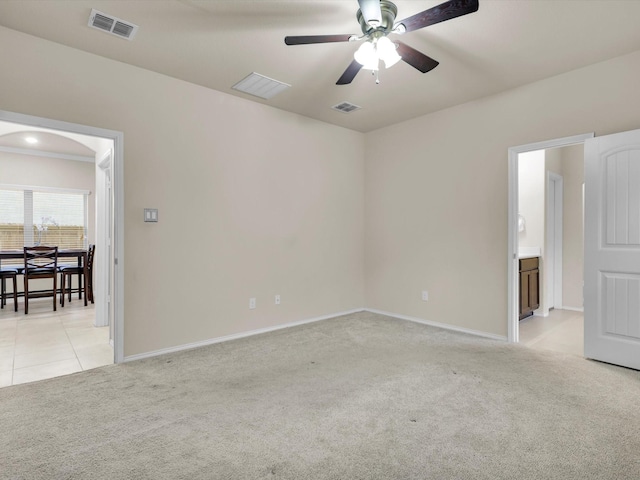 carpeted empty room with ceiling fan