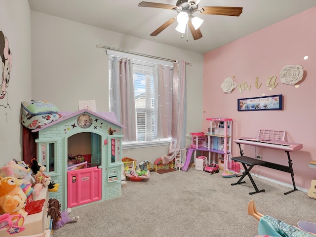 playroom with carpet flooring and ceiling fan