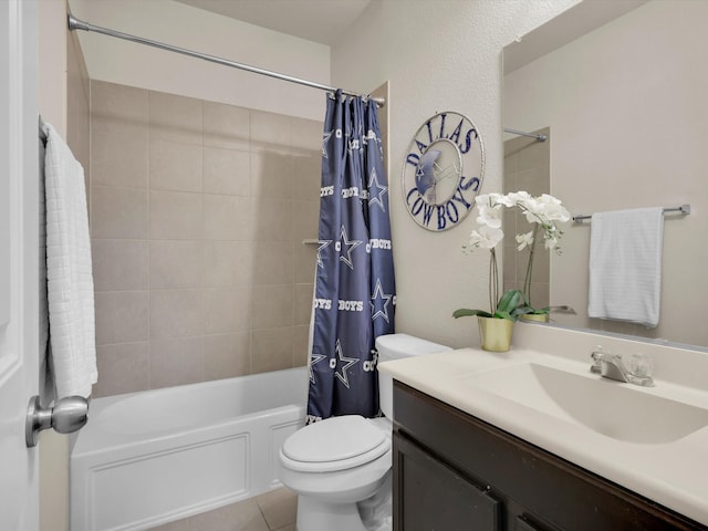 full bathroom with toilet, tile patterned flooring, shower / tub combo with curtain, and vanity