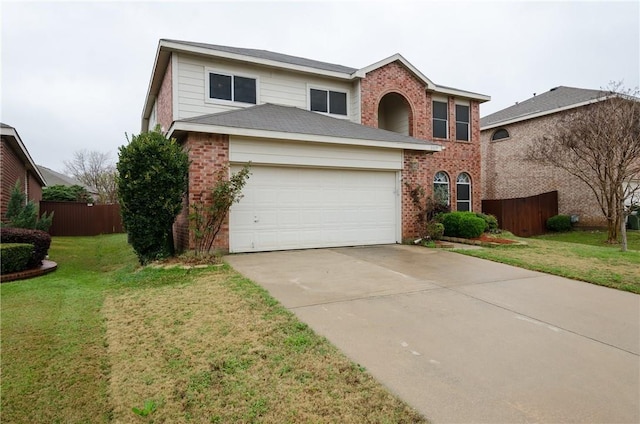 view of front of home featuring a front lawn and a garage